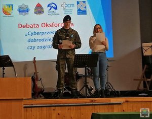 Uczestnicy debaty w trakcie spotkania